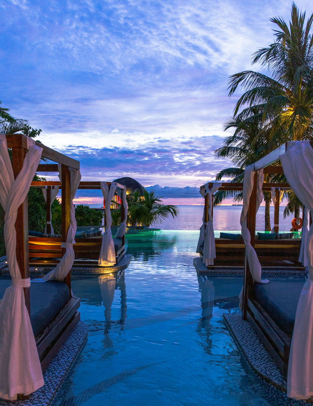 Beachfront accommodation among palm trees on the Zanzibar coast