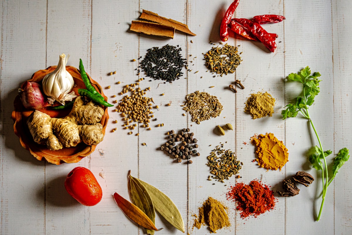 Guide showing fresh spices on a Zanzibar spice farm tour